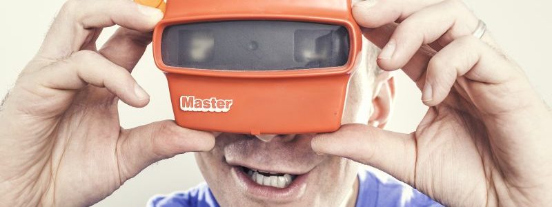 Man looking through a ViewMaster